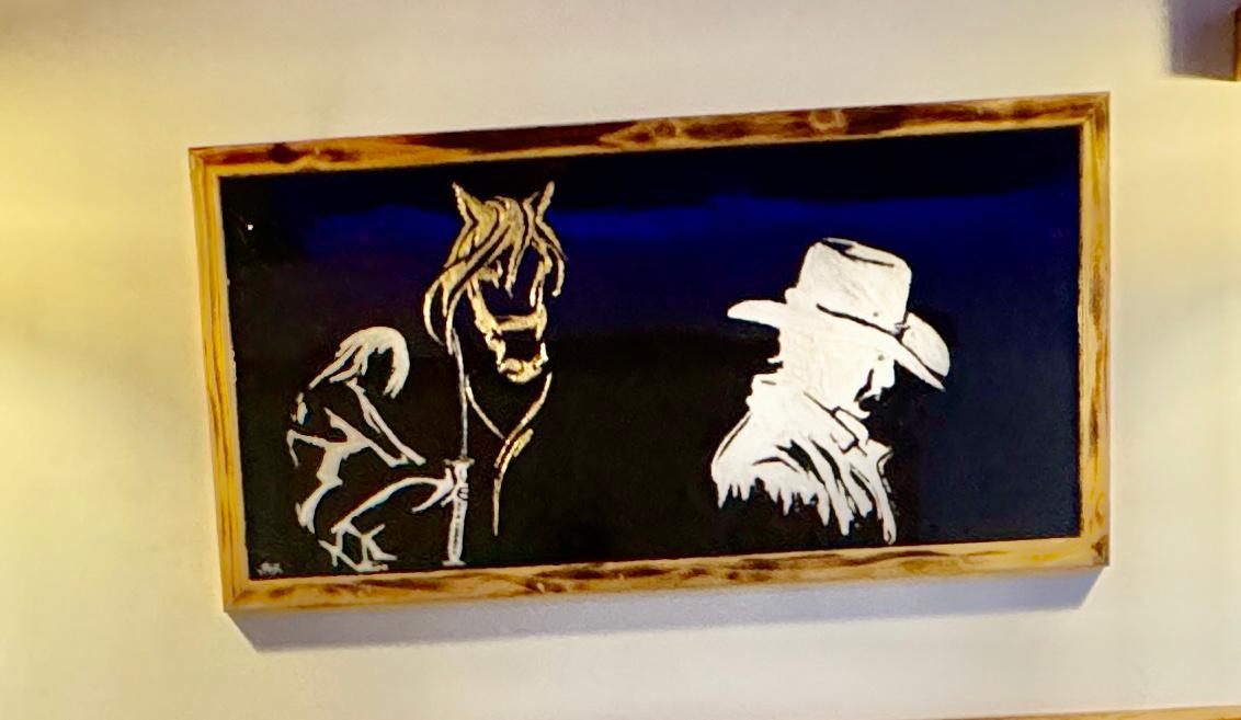 A resin and gold artwork by Salifa