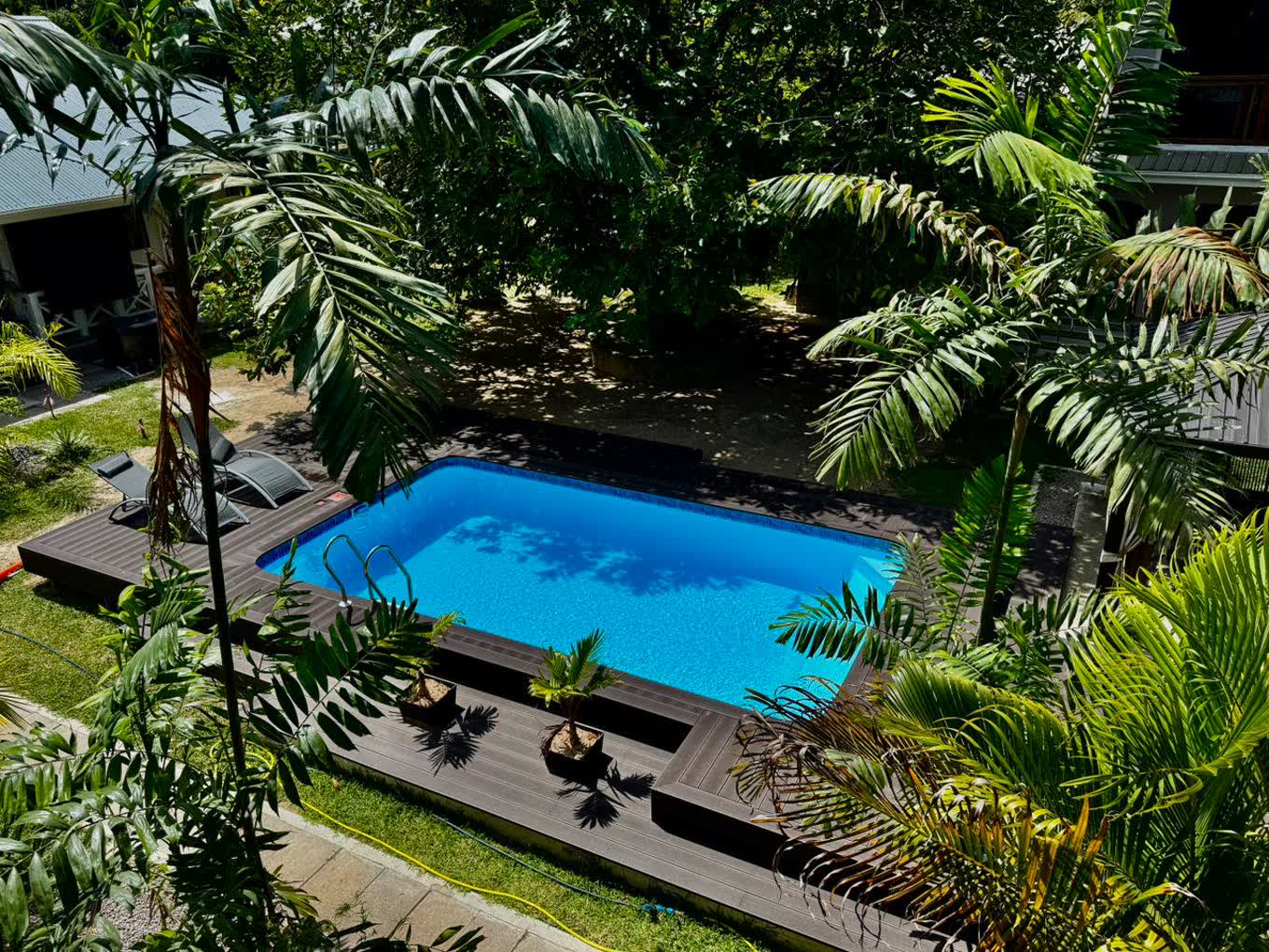 The pool and garden, built by hand at AliBel Beach Villa